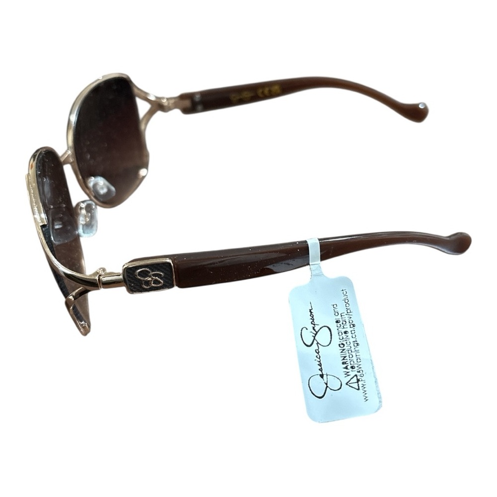 Jessica Simpson’s Elegant Light Brown Sunglasses with Gold trim. - Picture 2 of 5